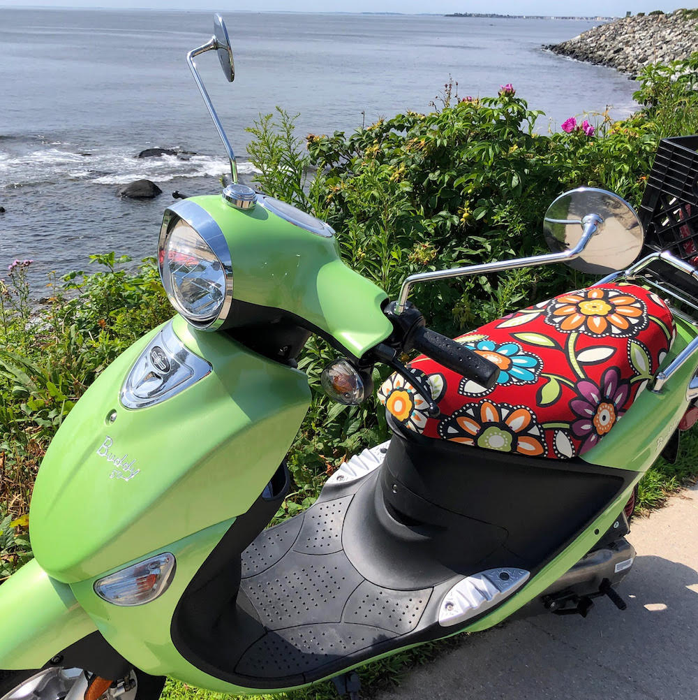 Genuine Buddy scooter fitted with a handmade Cheeky Seats seat cover