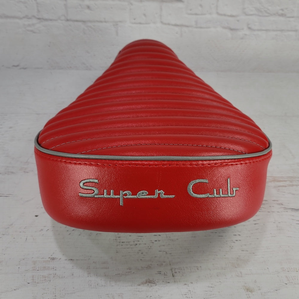 Honda Super Cub red mini pleat seat cover detail