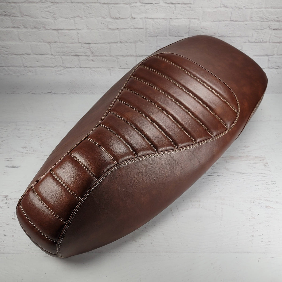 Vespa GTS padded whiskey brown tuck and roll seat cover
