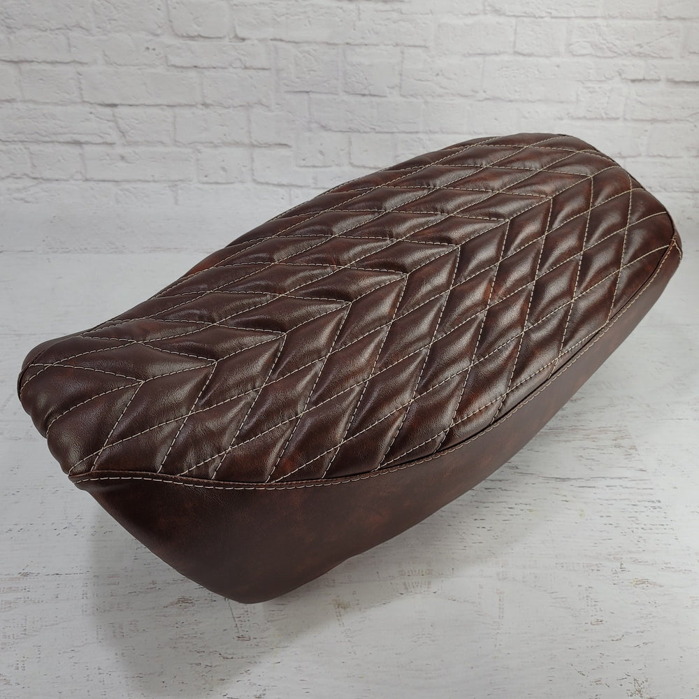 Honda Grom seat cover in distressed brown with chevron diamond stitching by Cheeky Seats