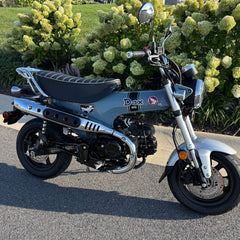 Pearl Gray-Honda DAX 125 with a black tuck-and-roll seat, with matching piping, handmade by Cheeky Seats