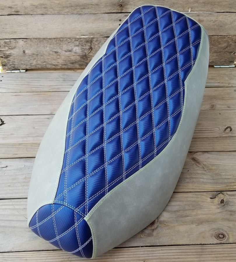 Blue and Gray Double Diamond Yamaha Zuma 50 seat cover with a quilted blue center, silver stitching and gray sides, handmade by Cheeky Seats.
