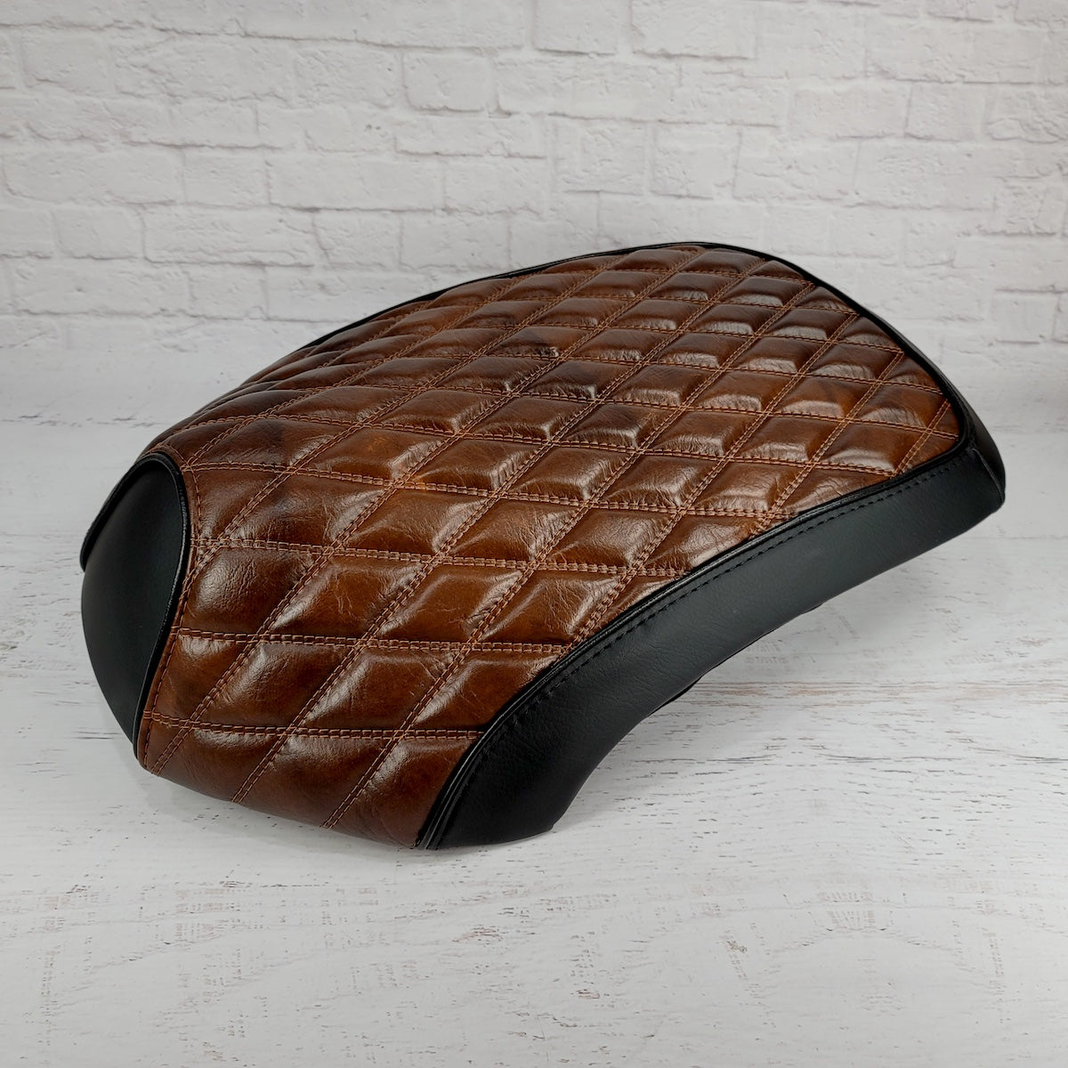 Low side view of the Espresso Brown Yamaha C3 seat cover showing its padded diamond stitching and fitted black border, handmade by Cheeky Seats.