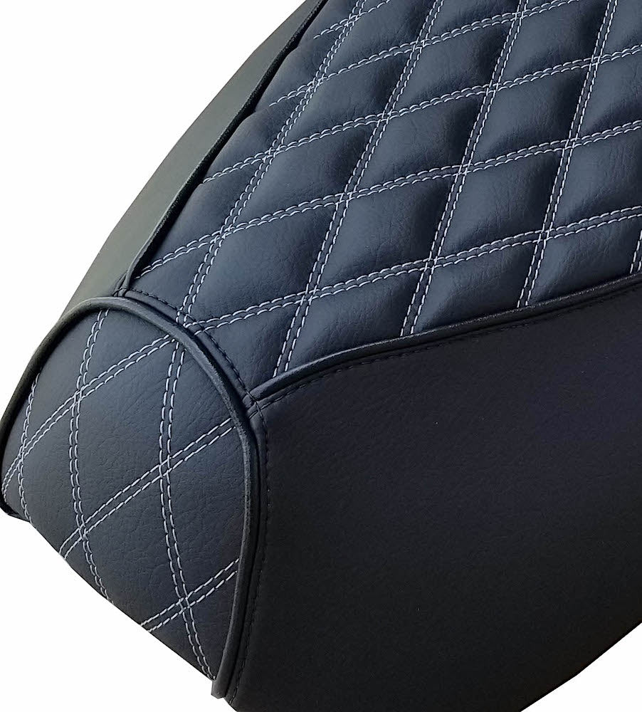 Close-up of the Black Double Diamond Yamaha Vino 125 seat cover showing contrast stitching, piping and panel construction, handmade by Cheeky Seats.