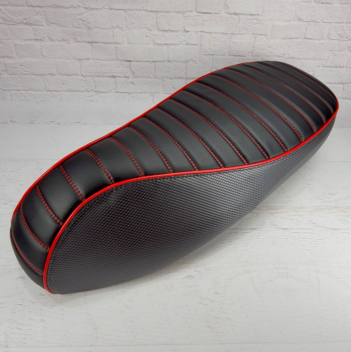 Vespa GTS padded charcoal and black tuck and roll seat cover